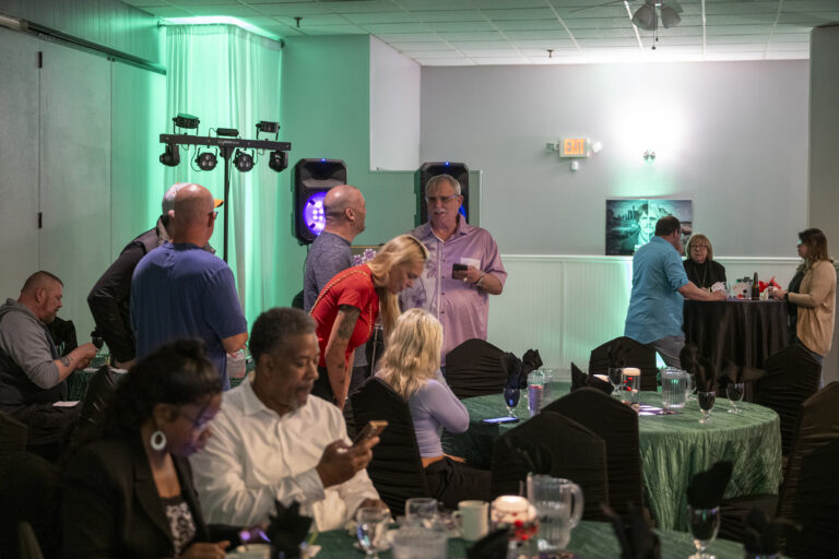 Book release party: Guests mingling around the tables