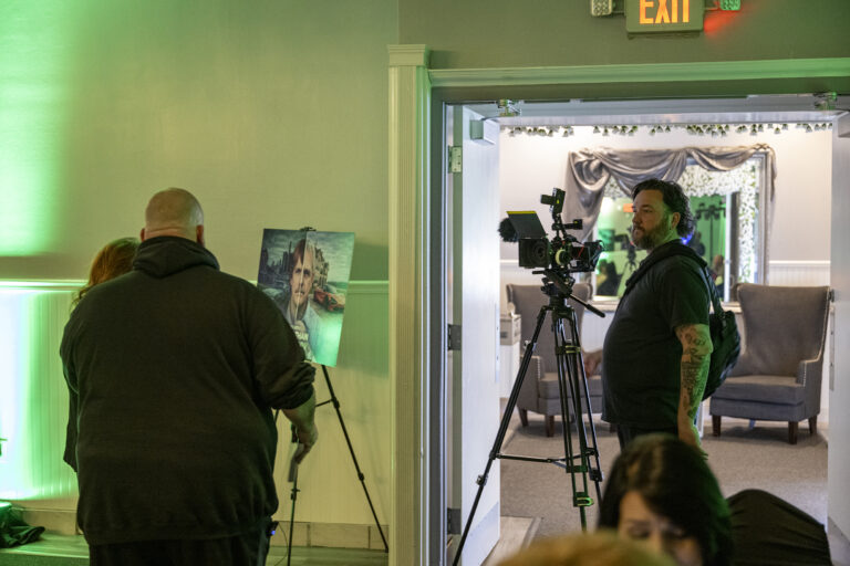 Book release party: Camera crew filming in the hallway