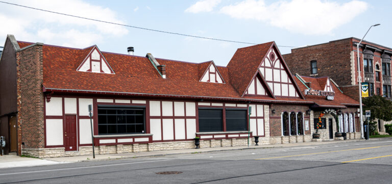 Tudor-style commercial building on a street corner