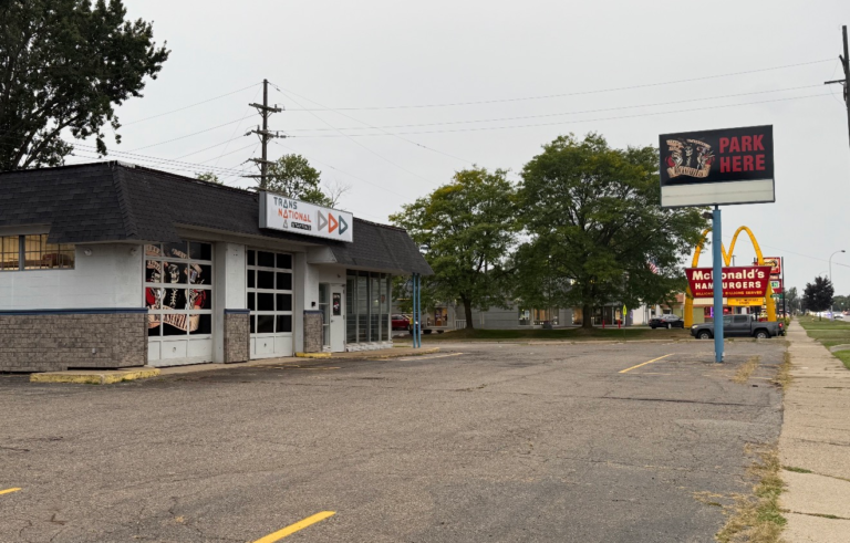 Commercial garage building and parking lot